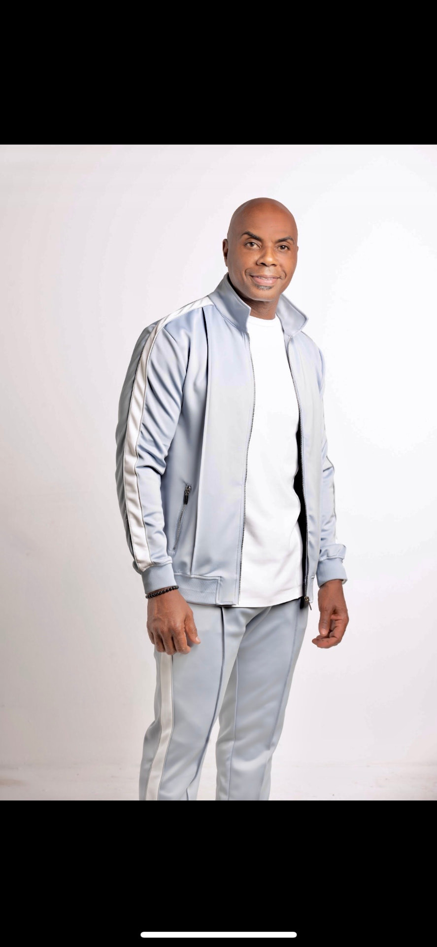 Toney Freeman today in a silver-grey tracksuit
